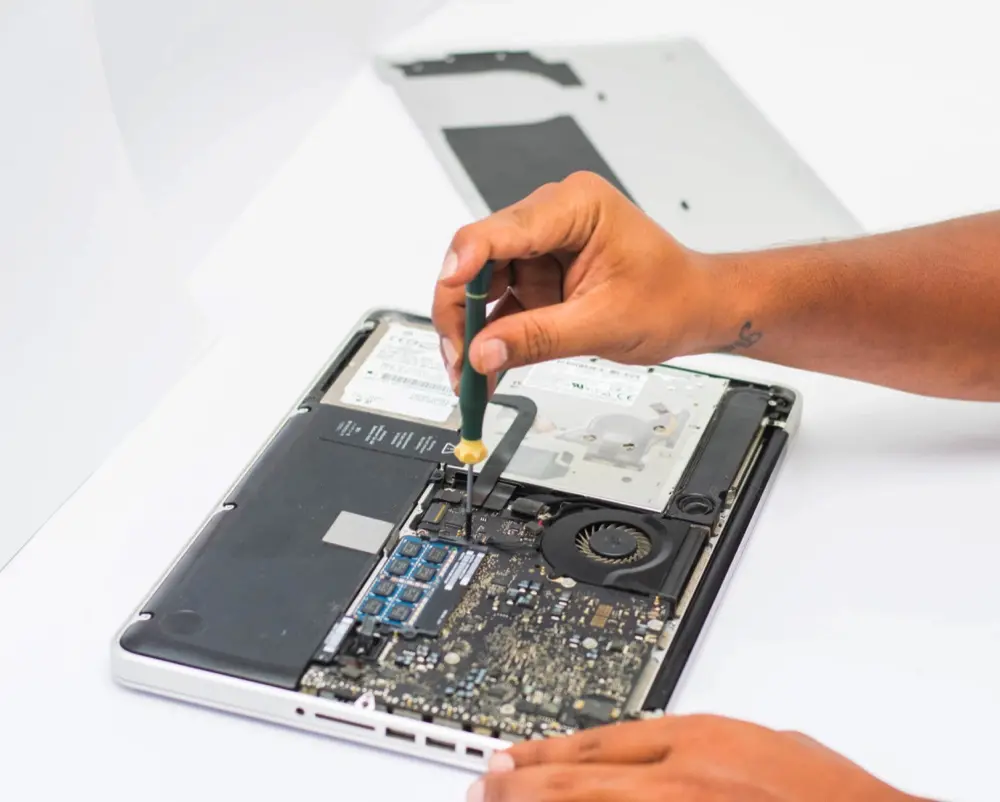technician-repair-macbook-motherboard-Ilab India